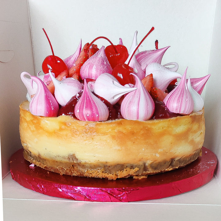 Eton Mess Cheesecake with strawberries, whipped cream, meringue kisses , crispy base, strawberry compote, smooth vanilla cheesecake filing ,