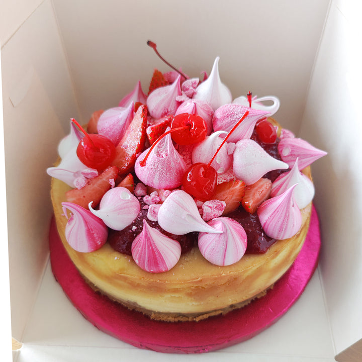 Eton Mess Cheesecake with strawberries, whipped cream, meringue kisses , crispy base, strawberry compote, smooth vanilla cheesecake filing ,