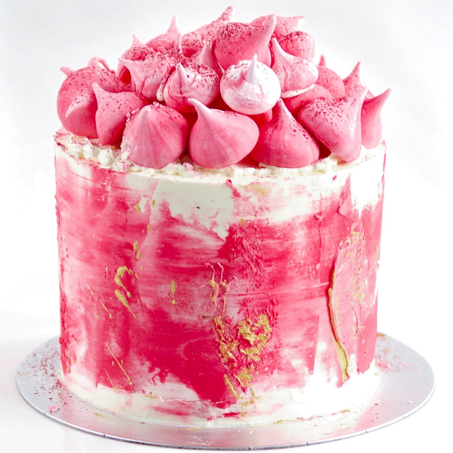 Punk Cake offers celebration cakes in a range of flavours and decoration styles. Our Lemon, Raspberry & Cream Layer Cake, comes with a stunning pink buttercream frosting, topped with meringues. All our cakes are available for delivery across London.  