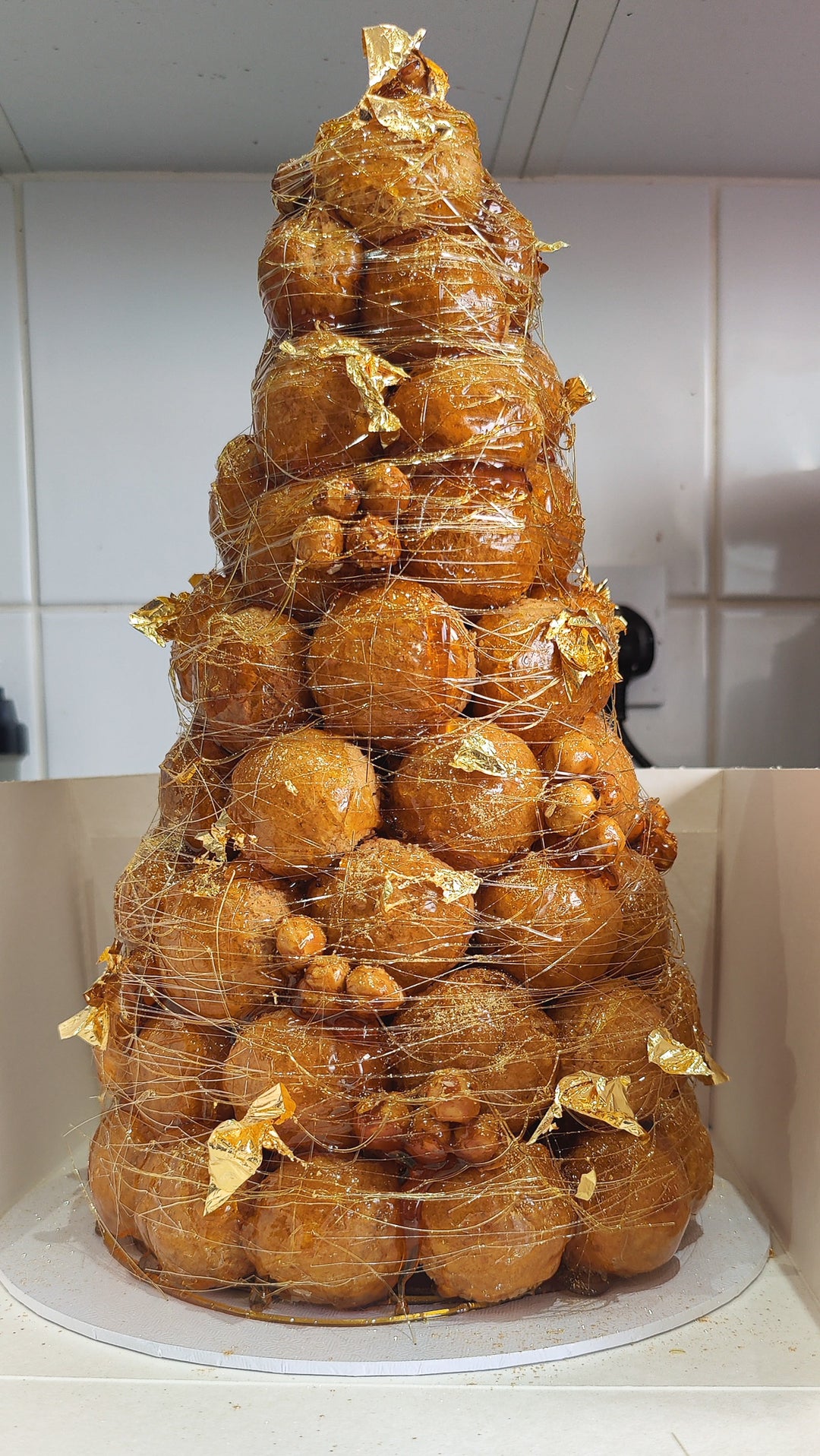 Mini croquembouche with hazelnut and edible 24ct gold leaf